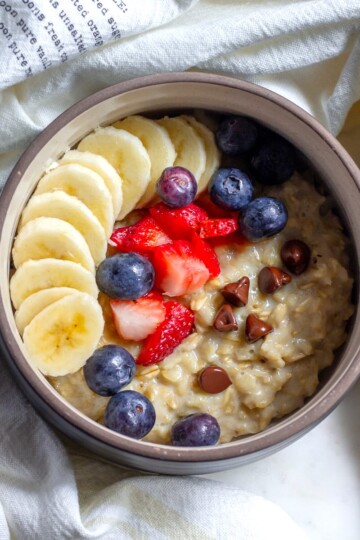 Breakfast Oatmeal with Fresh Fruits and Chocolate Chips served in a Bowl