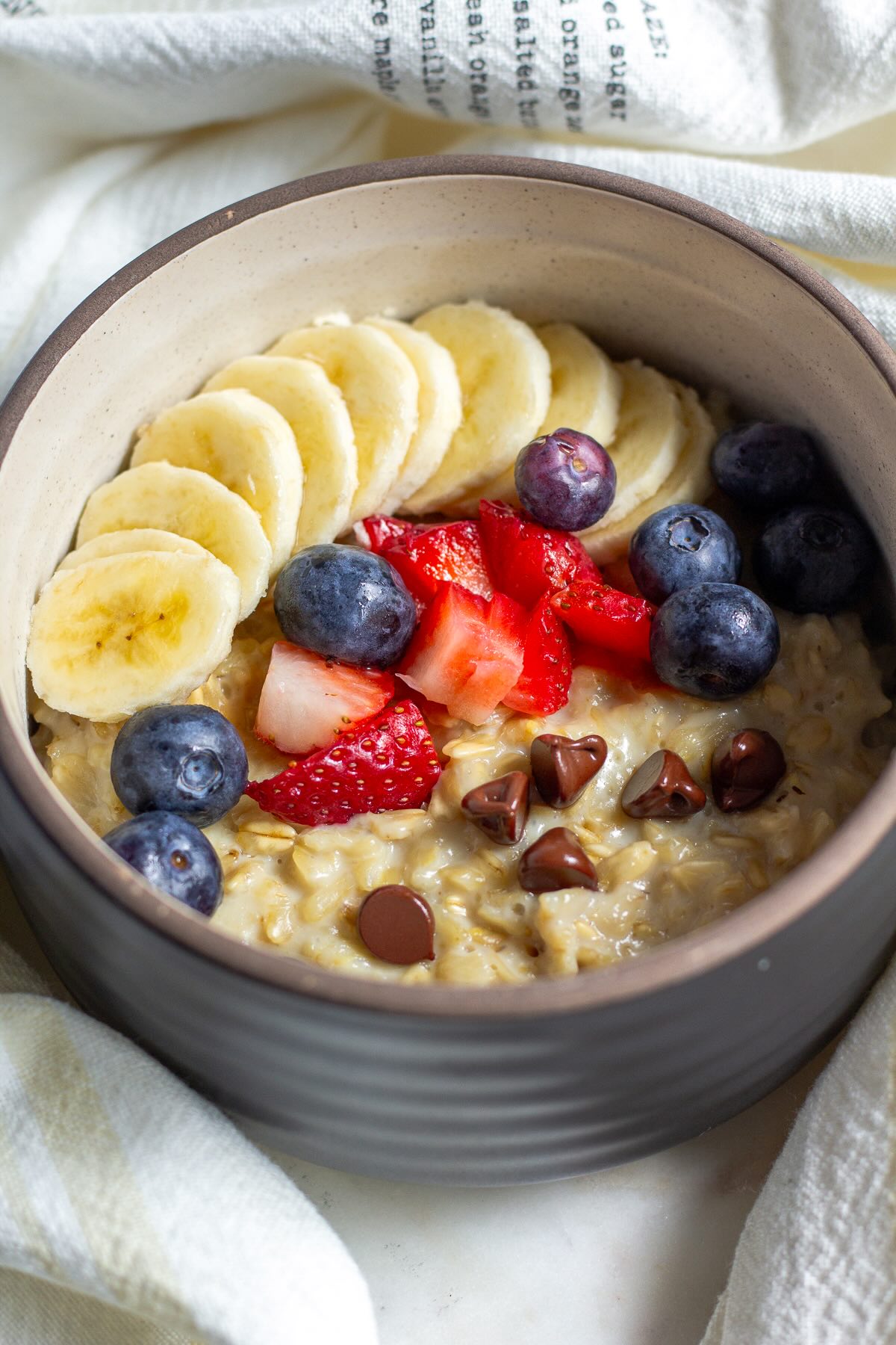Breakfast Oatmeal with Fresh Fruits and Chocolate Chips
