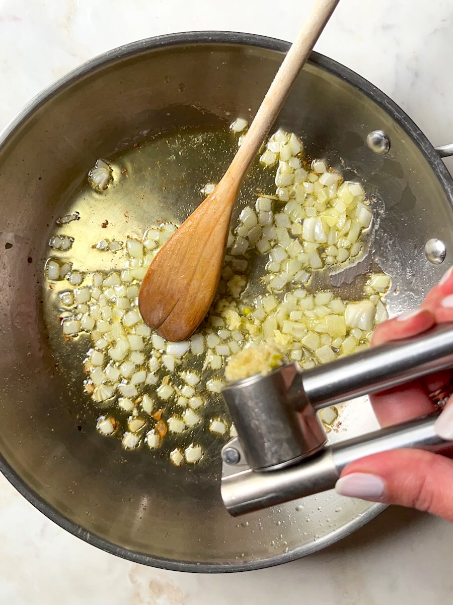 Stuffed bell peppers without meat, add garlic to onion.