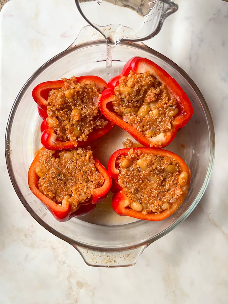 Stuffed bell peppers without meat, add water to the baking dish with peppers.