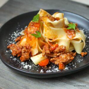 Turkey ragu pasta or turkey mince bolognese with jar pasta sauce served on a plate