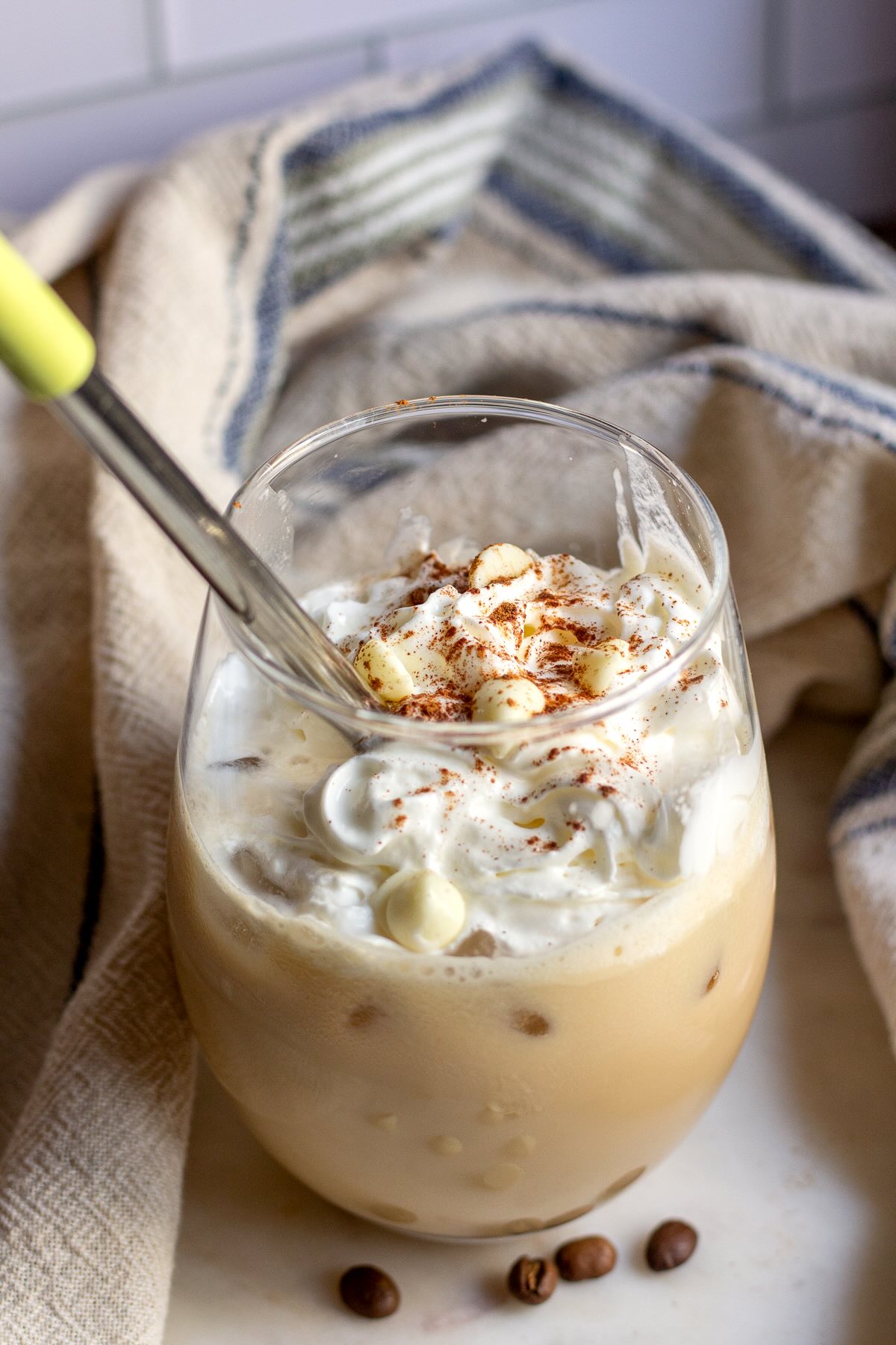 Iced White Chocolate Mocha Copycat Served in a Glass with Whipped Cream.