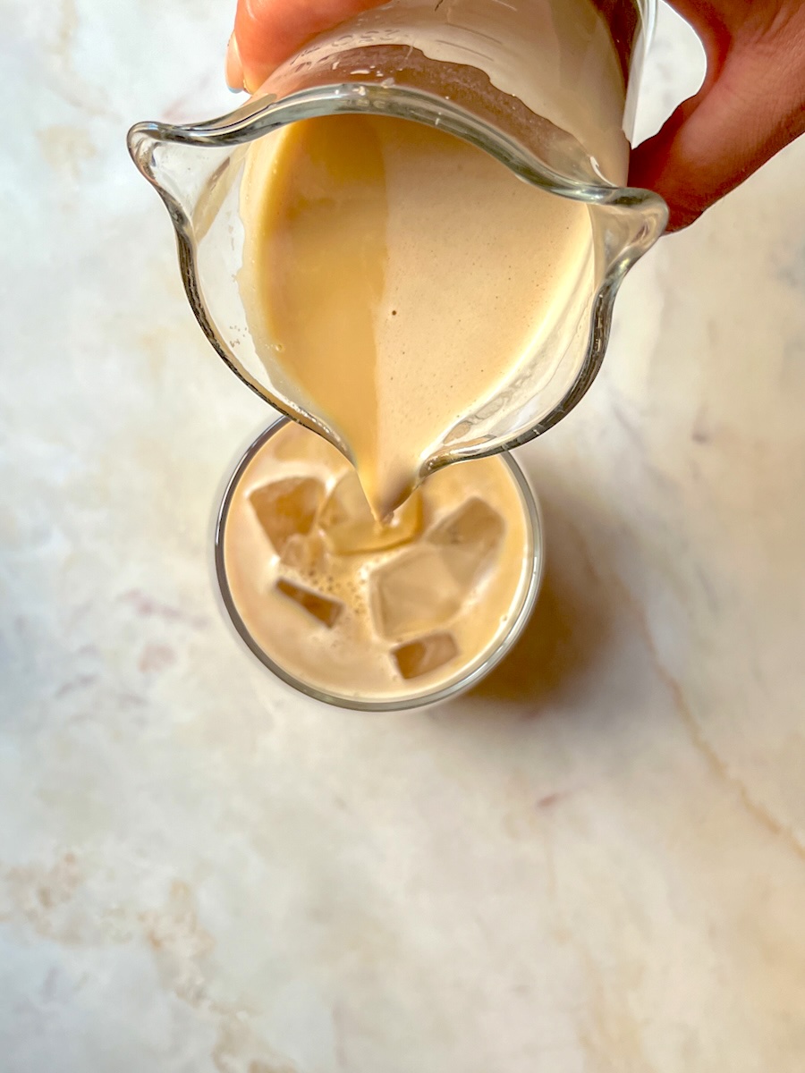 Iced White Chocolate Mocha Copycat Recipe, pour the mixture over ice cubes.