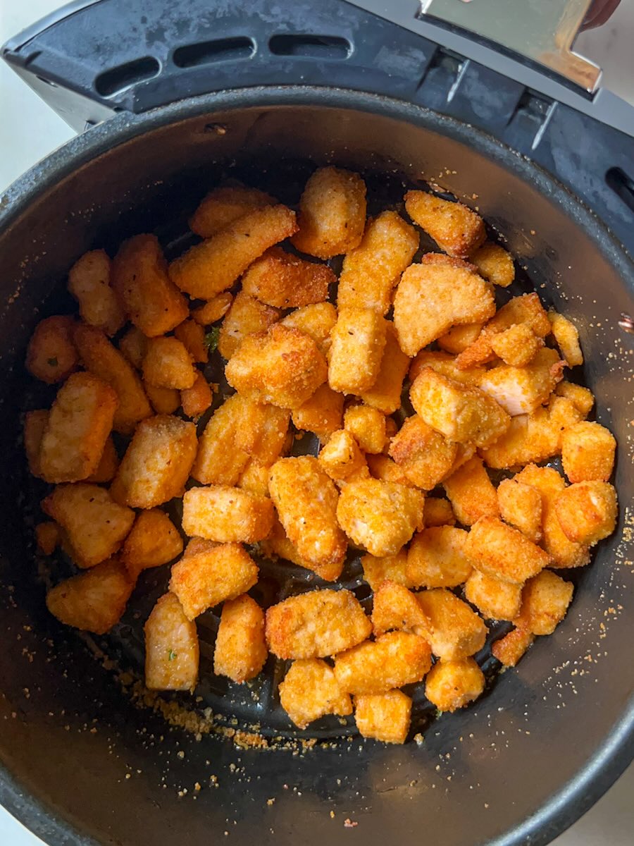 Air Fryer Salmon Bites with Garlic, cook until golden brown on all sides.