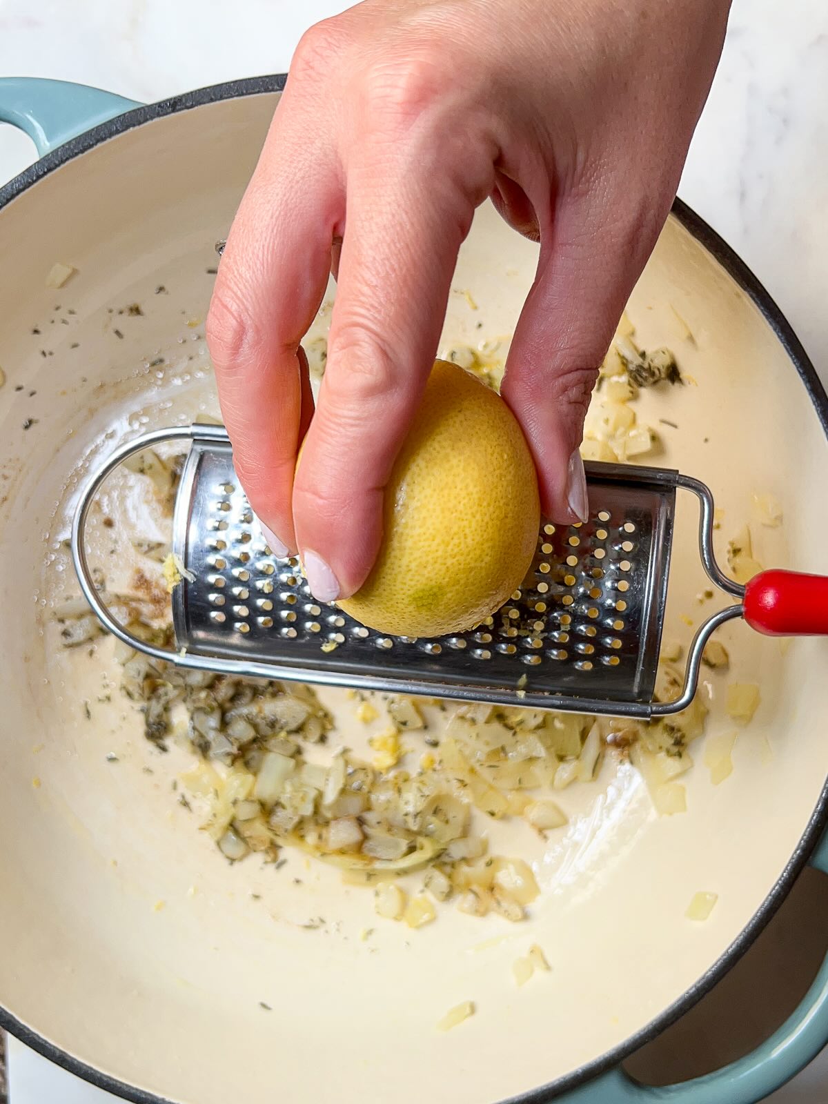 Mediterranean Rice preparation, step 4, add lemon zest.