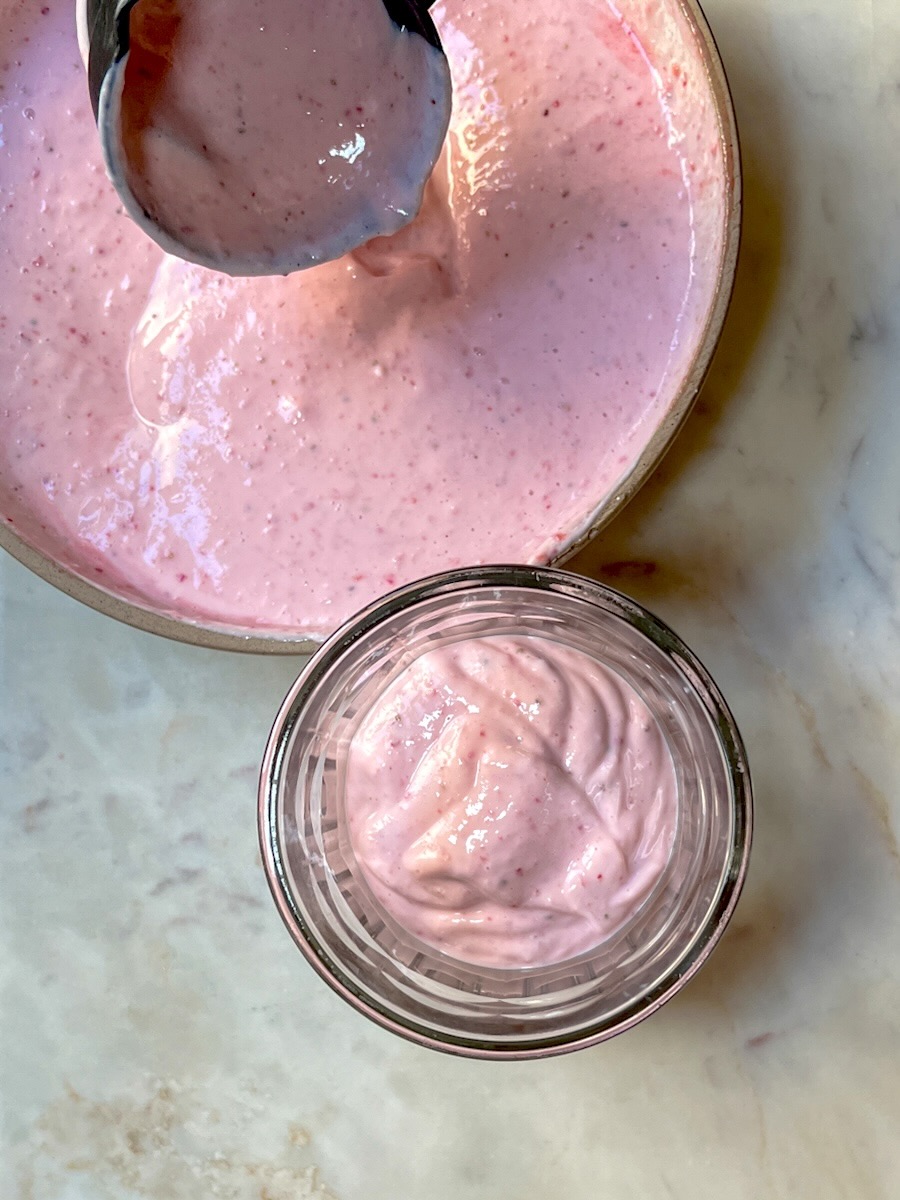 Strawberry Yogurt recipe, add strawberry yogurt to serving glasses.