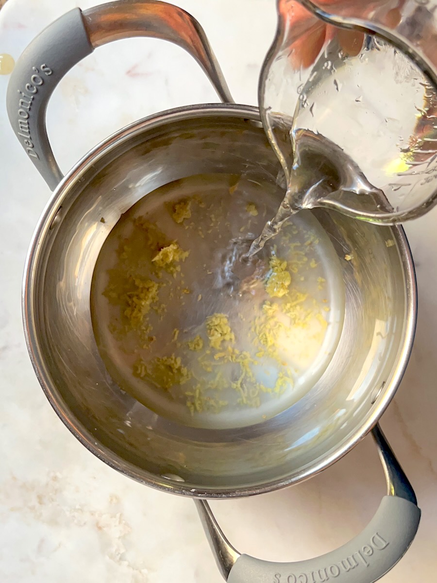 Ginger Lemonade, add water to grated ginger.