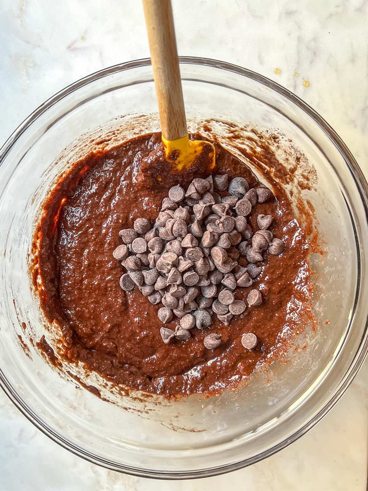 Banana Almond Flour Brownies, adding chocolate chips.