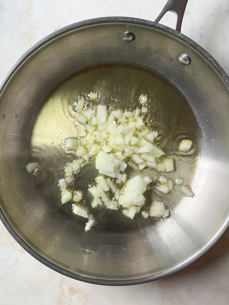 Gluten Free Meat and Rice Stuffed Peppers, Cook the Onions.