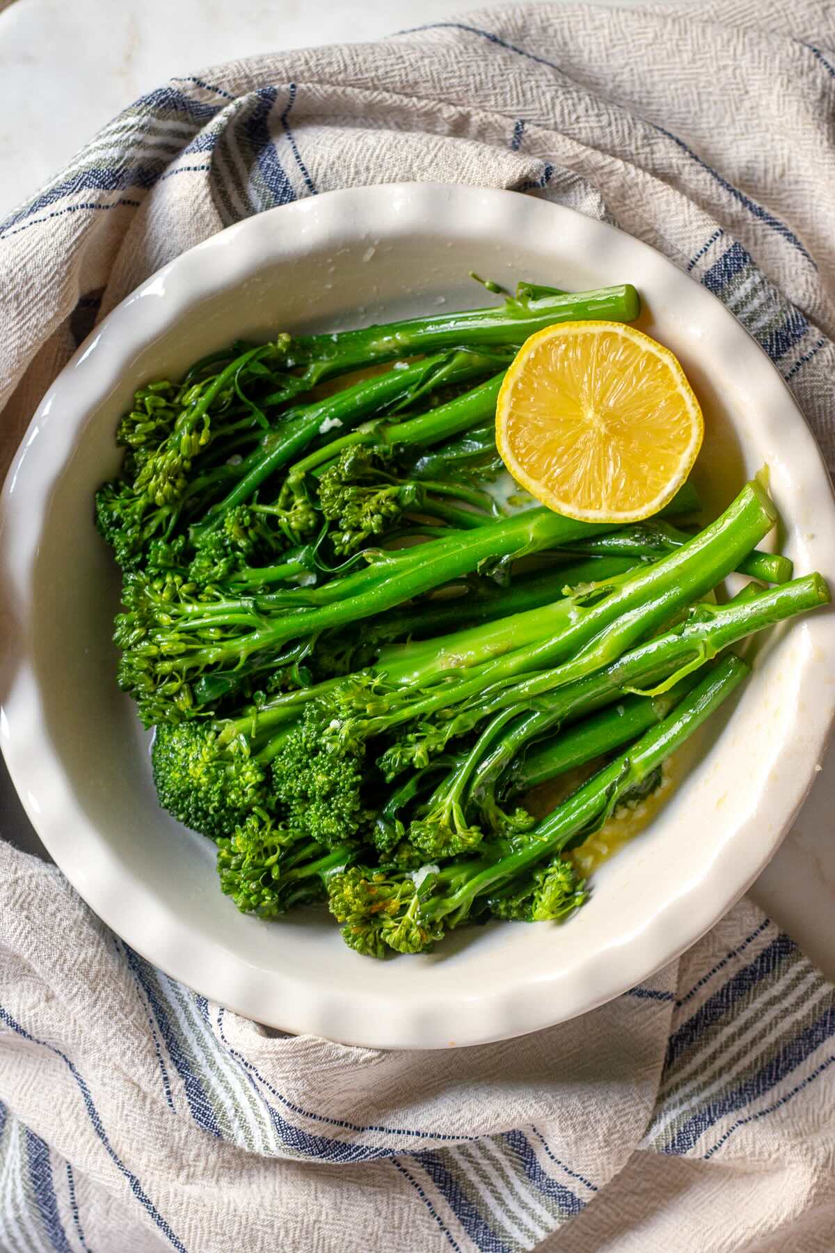 Steamed Broccolini with Garlic and Lemon in a serving dish.