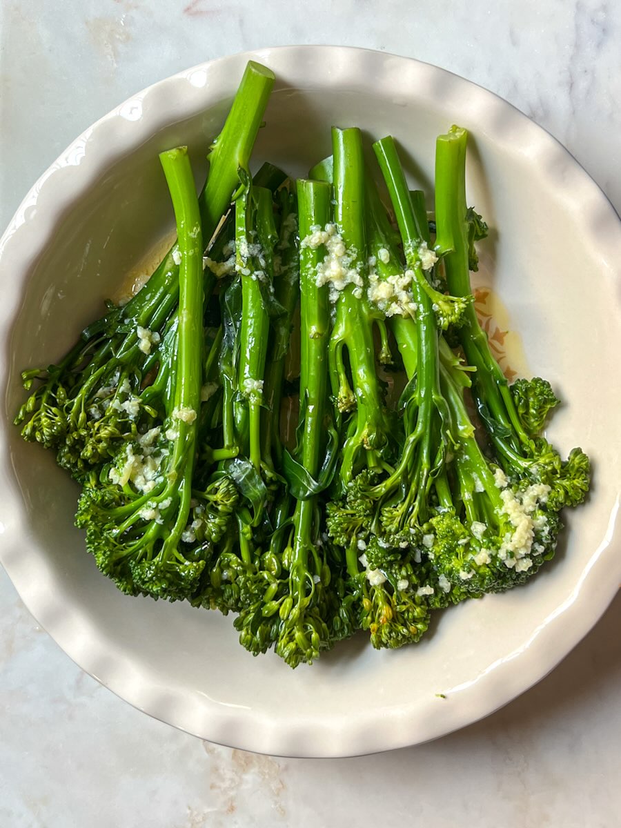 Steamed Broccolini with garlic and lemon, add garlic mixture to steamed broccolini.