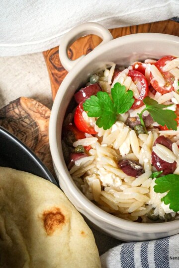 Lemon orzo with feta salad served in a bowl