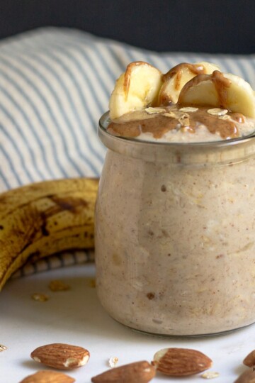 Almond flour overnight oats with banana served in a cup