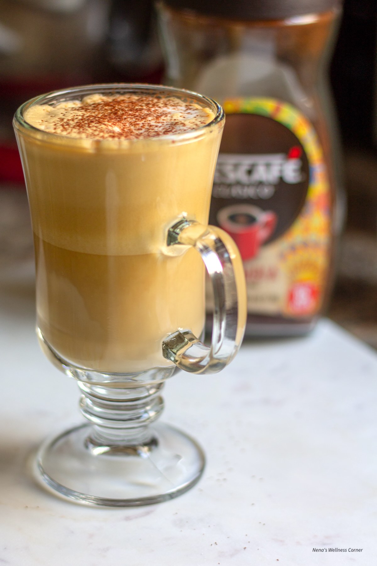 Nescafe frappe (Greek frappe coffee) served in a glass cup