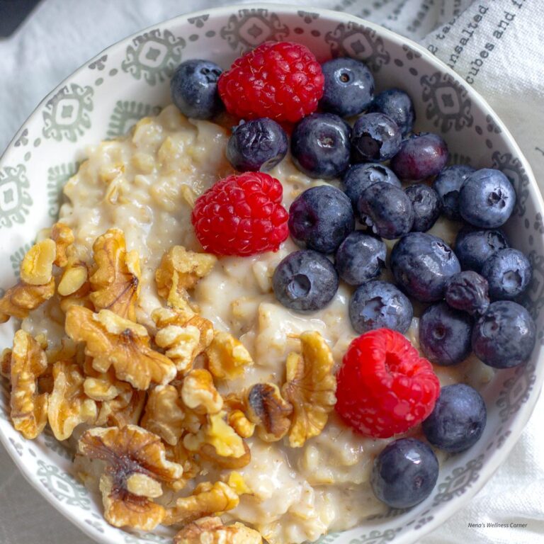 Oatmeal with berries and walnuts served in a bowl