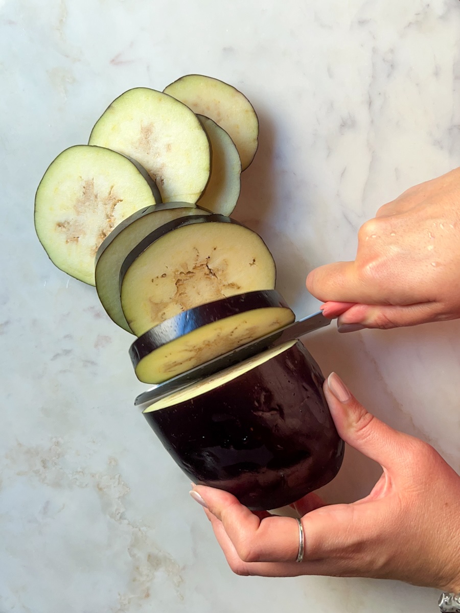 Baked cheesy eggplant, slice the eggplant.