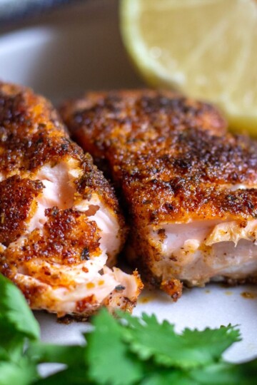 Almond flour crusted salmon served on a plate with veggies_2