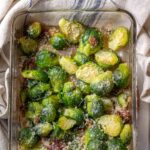 Oven bake prosciutto brussels sprouts in a baking dish