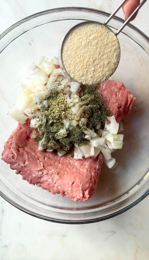 cast-iron turkey burgers preparation, step 1, prepare the mixture in a large bowl.