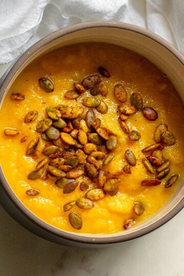 A warm and creamy pumpkin soup with a touch of fresh ginger, bringing a perfect balance of sweetness and spice in every spoonful.