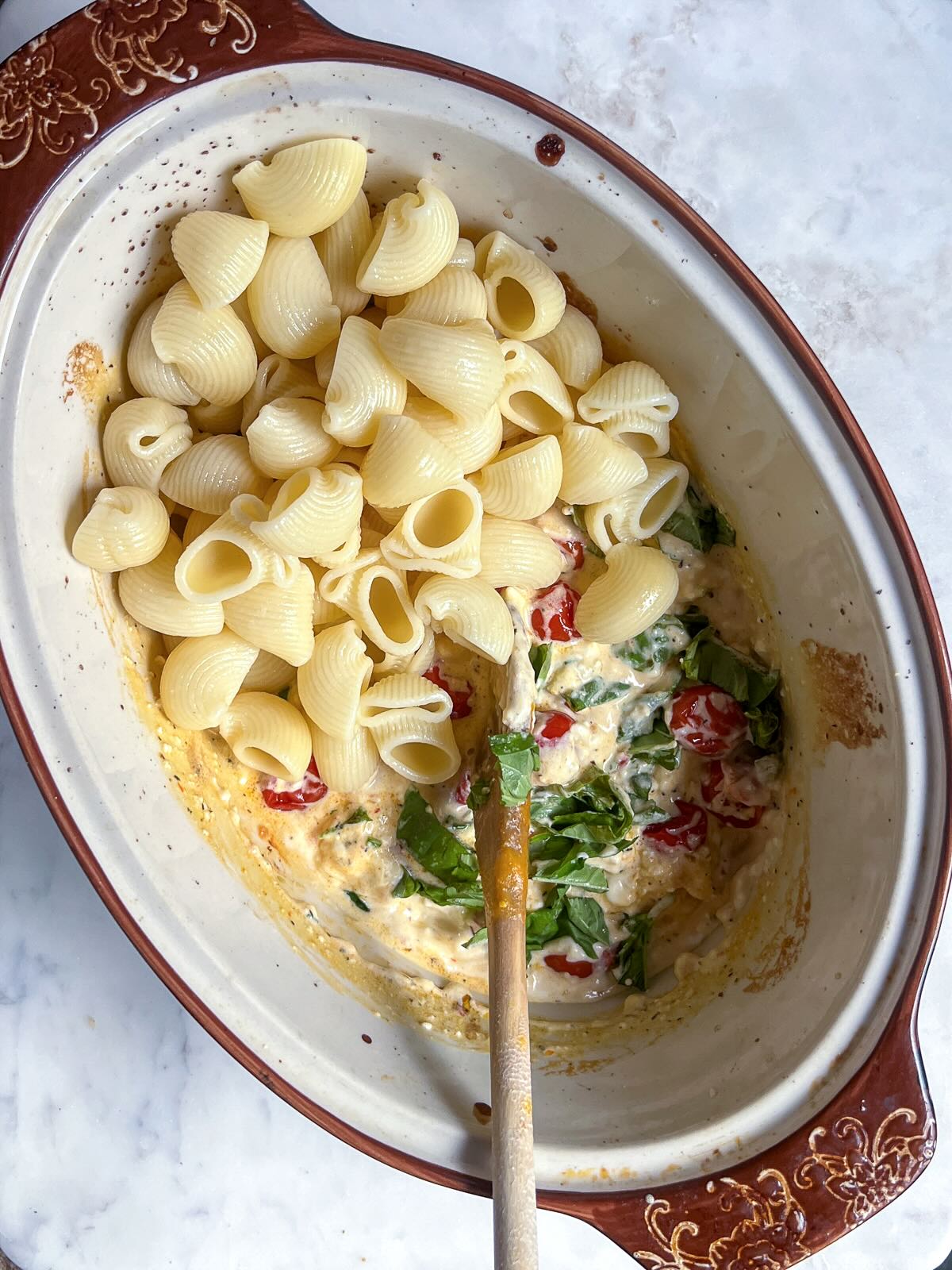 Baked Feta Pasta, add cooked pasta.