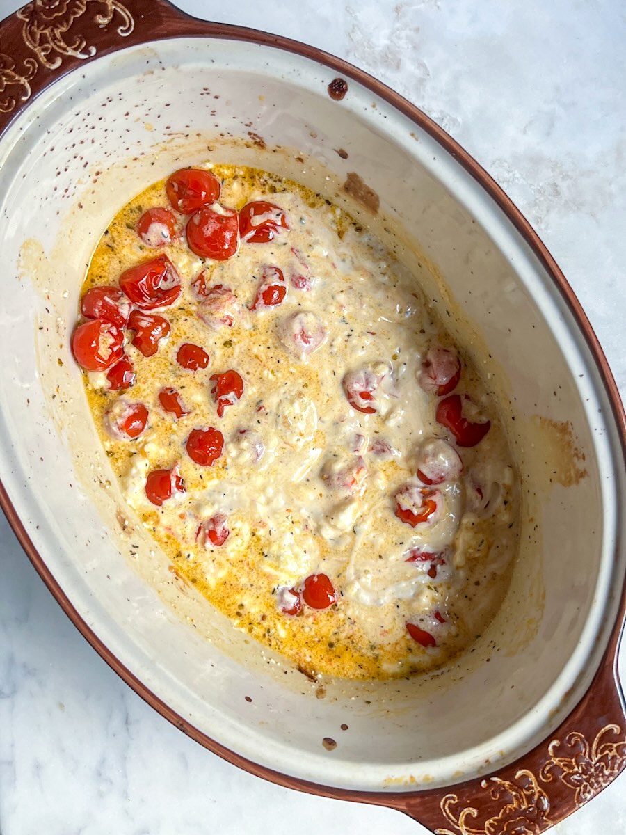 Baked feta pasta, mix baked feta and cherry tomatoes.