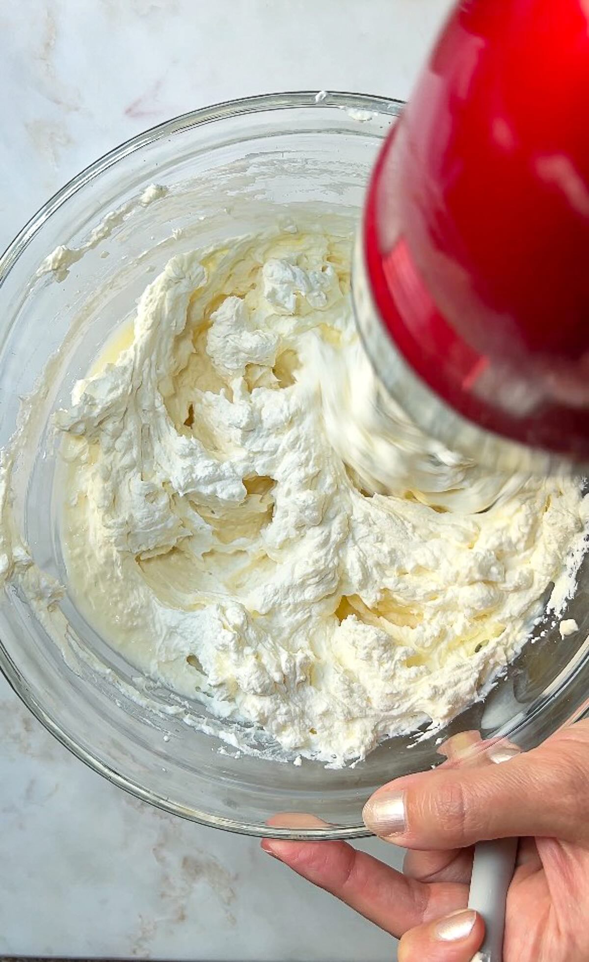Tiramisu cups without mascarpone, incorporating whipped cream and cream cheese mixture.