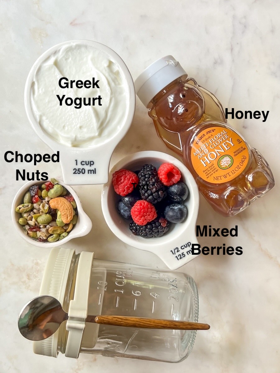 Yogurt parfait breakfast, labeled ingredients.