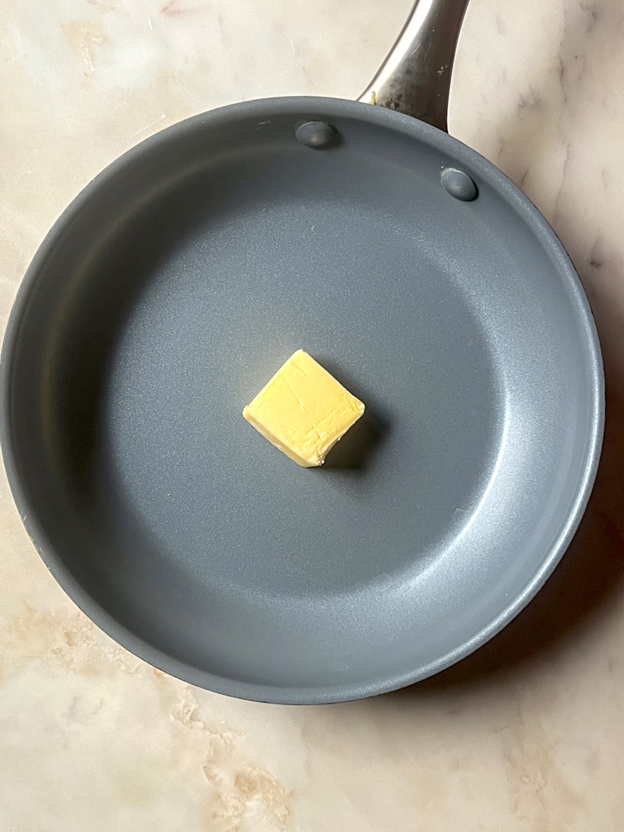 Green Beans with Garlic, melt the butter.