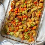 Vegetable stuffing casserole ready to be served at Thanksgiving dinner.