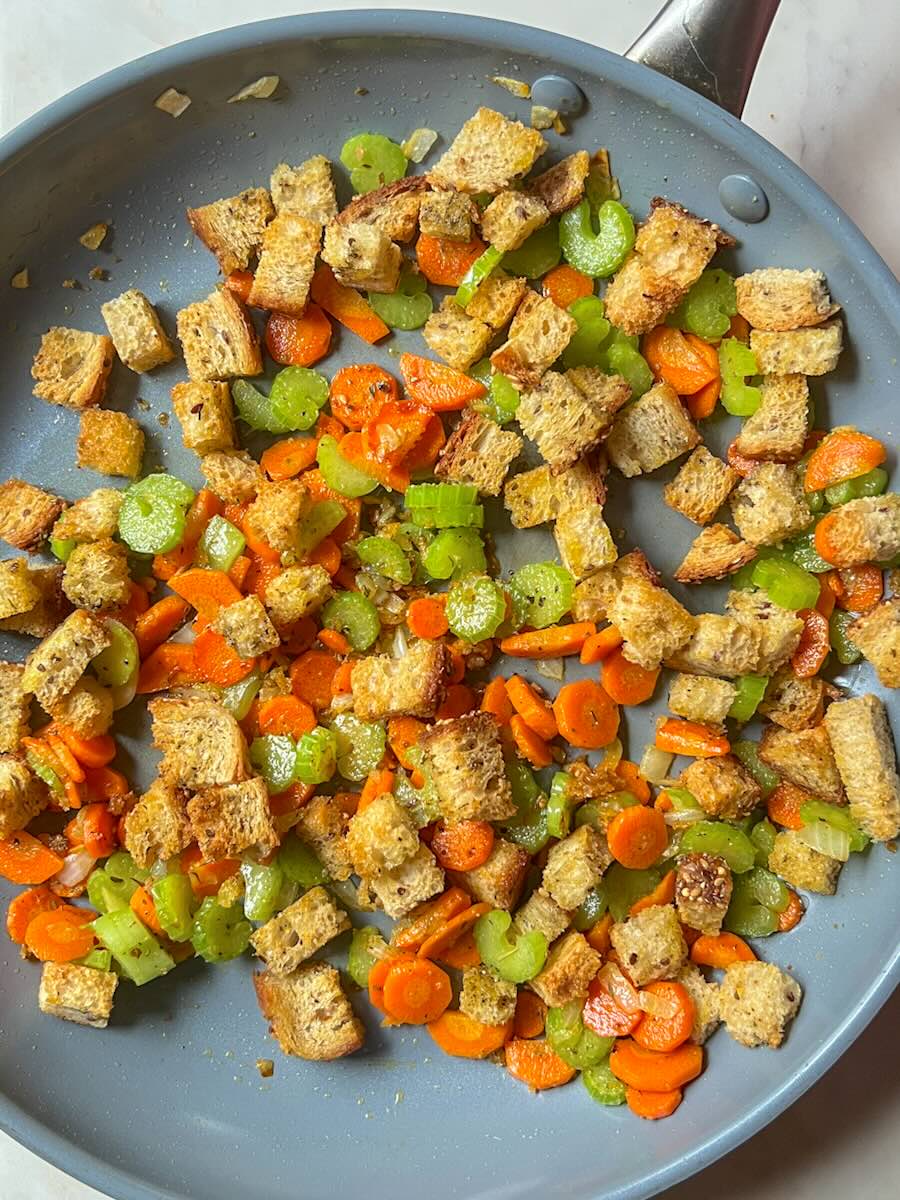 Vegetable stuffing casserole, Add the toasted bread cubes to the skillet with the vegetables.