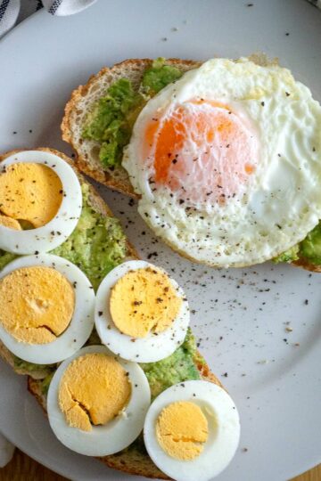 Avocado Egg Toast Served with Boiled Egg and Fried Egg.