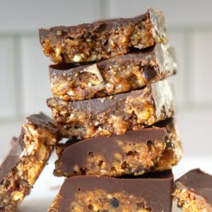 Date and nut bars served on a plate.