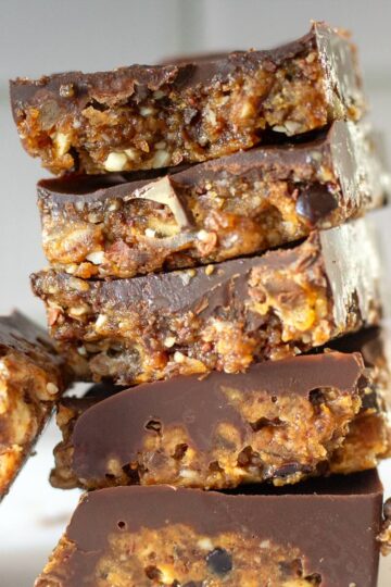Date and nut bars served on a plate.