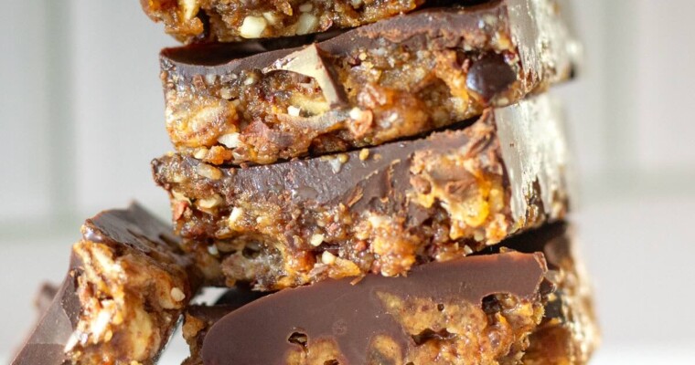 Date and nut bars served on a plate.