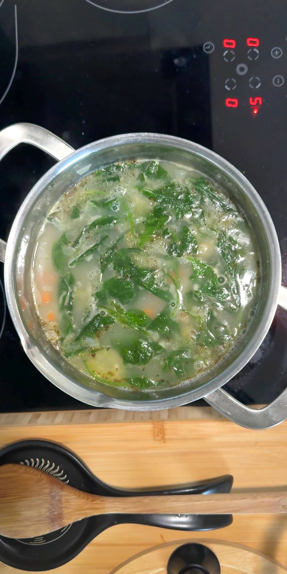 Lemon White Bean Soup Adding Spinach.