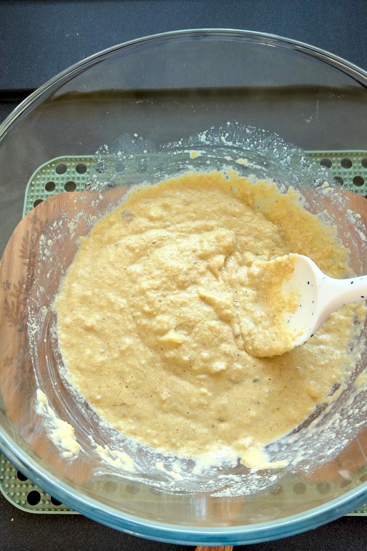 Ingredients for gluten-free pancakes including almond flour, oat flour, banana, and eggs